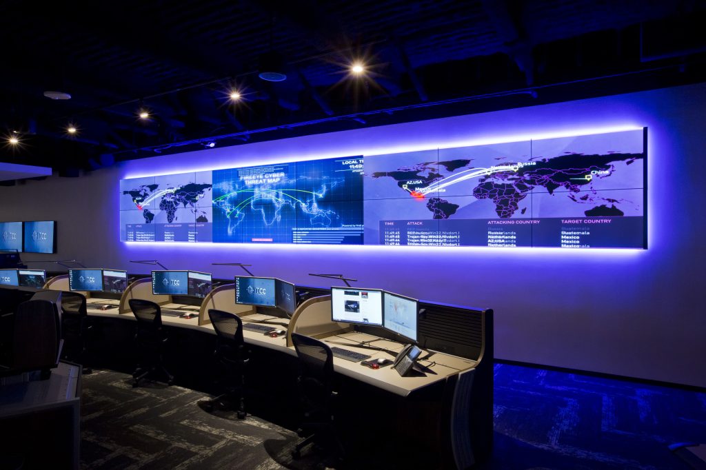 A large screen in a control room.